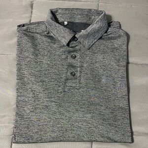 Under Armour long sleeved button down polo. Size M